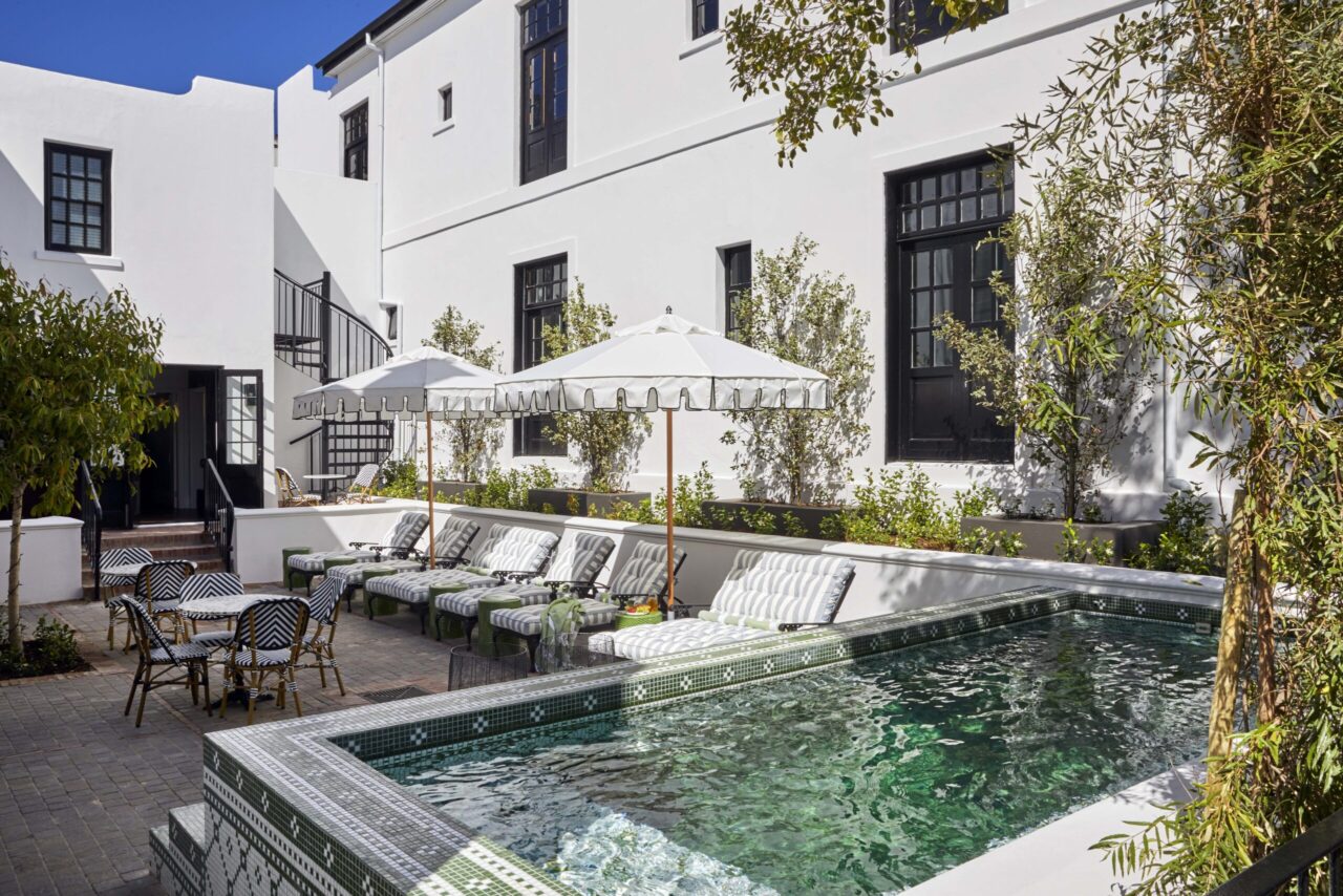 A communal pool area at Cape Cadogan, a honeymoon safari stay, Cape Town, South Africa.