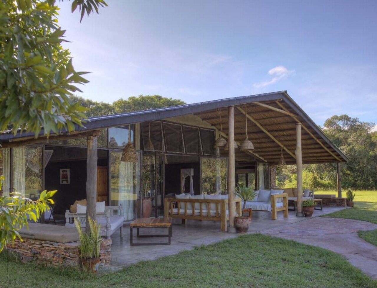 A private deck looks out over the bush, House in the Wild, Kenya.